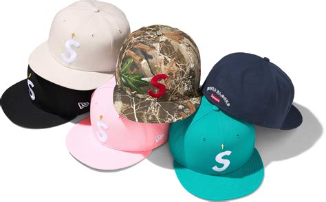 supreme gold cross headwear.